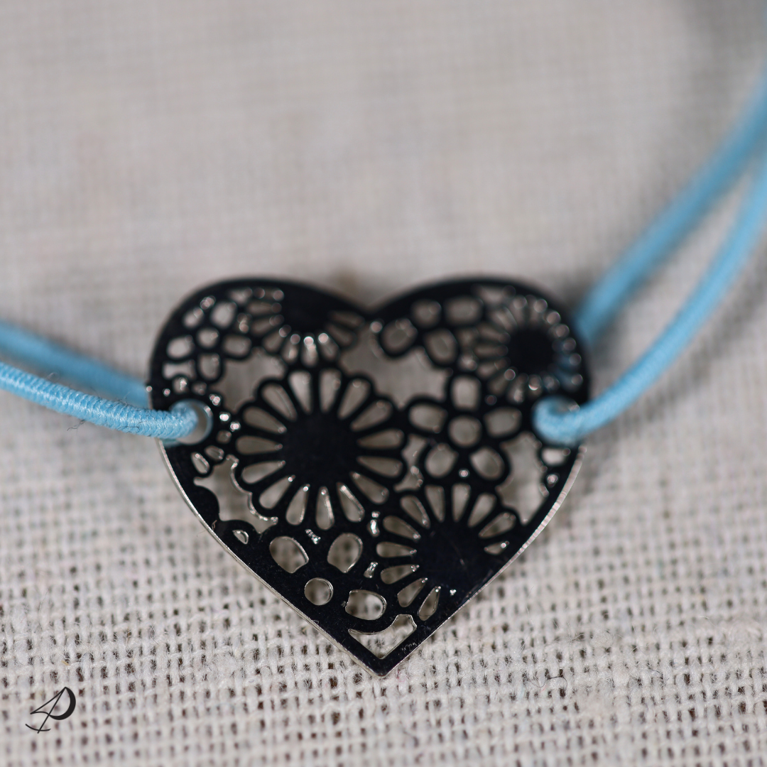 Bracelet élastique Coeur bleu avec pendentif argenté