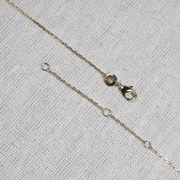 Chaîne réglable forçat diamantée dorée. 40, 42 et 45 cm.