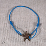 Bracelet élastique Étoile de mer bleu avec pendentif doré