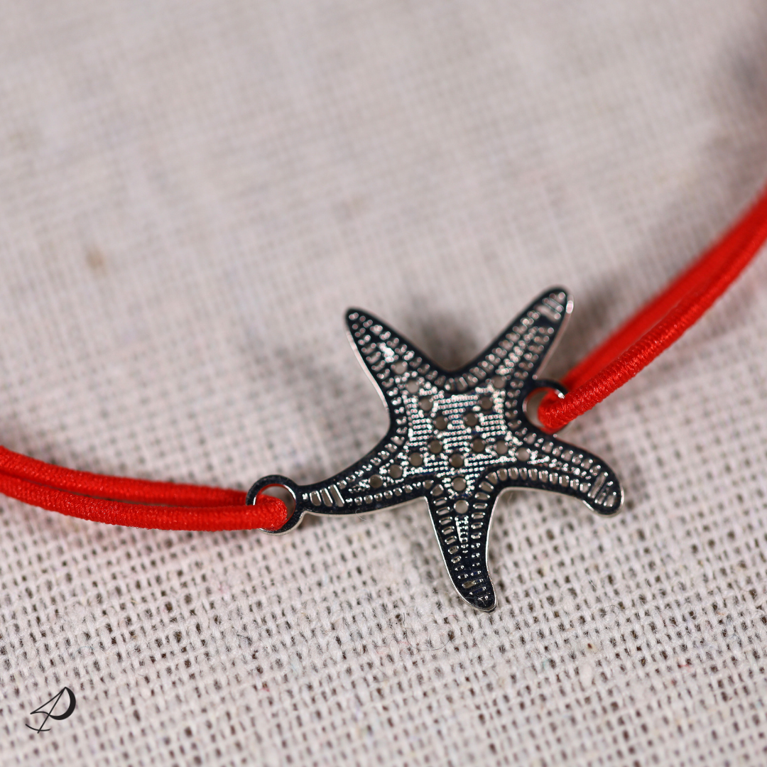 Bracelet élastique Étoile de mer rouge avec pendentif argenté